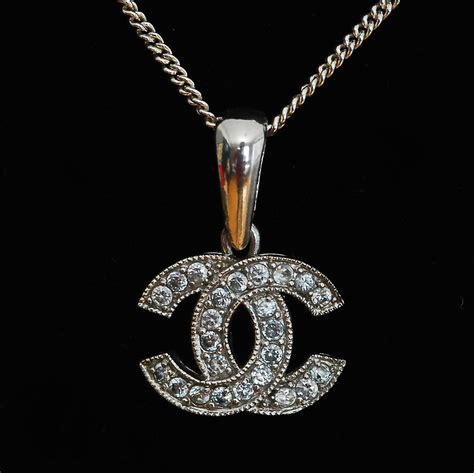 chanel cc crystal silver tone pendant necklace|long chanel necklace with pearls.